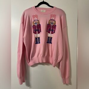 Pink Sweater with Nutcracker Design